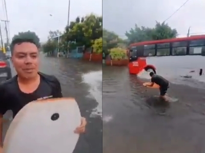 Jovem aproveita a enchente para surfar em Guadalajara